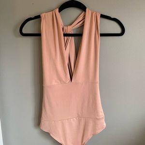 Salmon pink like cut, criss cross back body suit.